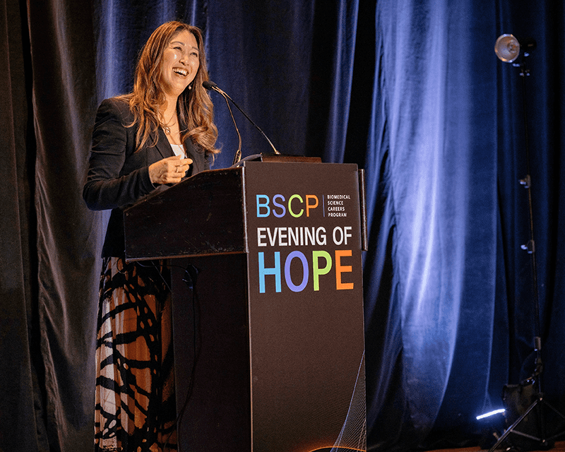 Julie Kim from Takeda speaking at Evening of Hope 2025
